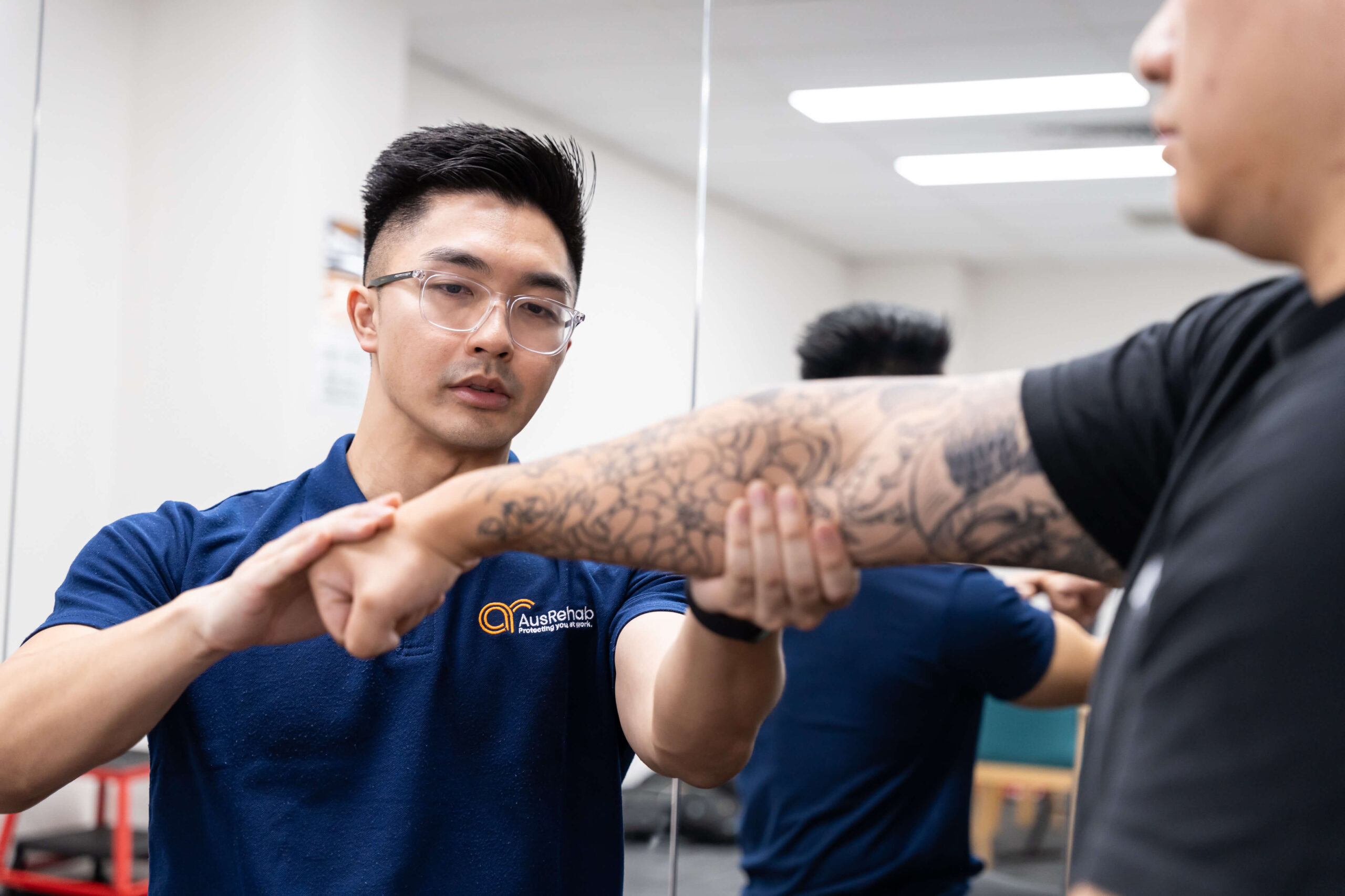 An exercise physiologist is performing functional capacity assessment on an injured worker.