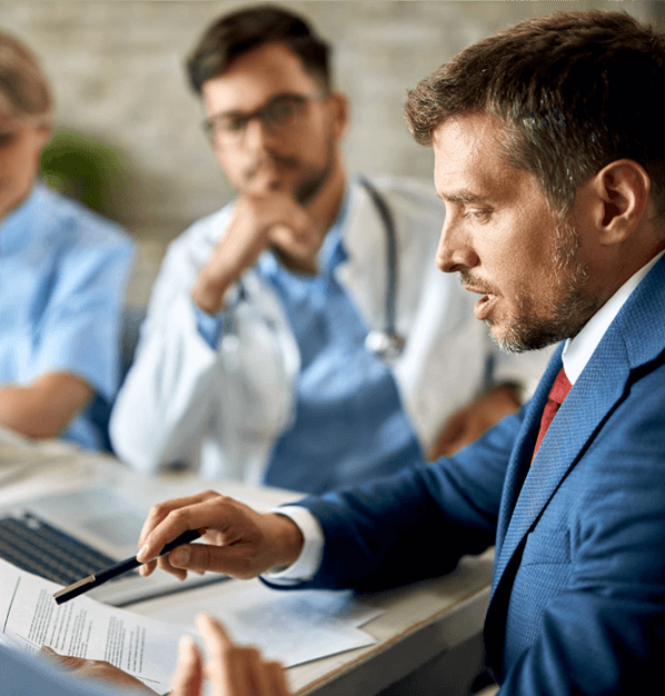 As part of the same employer rehabilitation service, occupational rehab consultants are having a medical case conference to come up with a return to work plan.